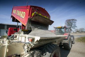 Lime spreading machinery and truck spreading agricultural lime in North Yorkshire, Yorkshire Dales and the north of England